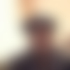 M.