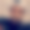M.